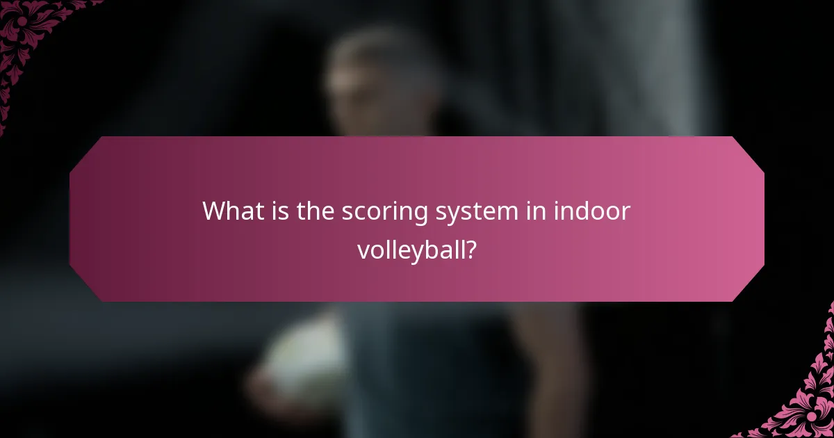 What is the scoring system in indoor volleyball?
